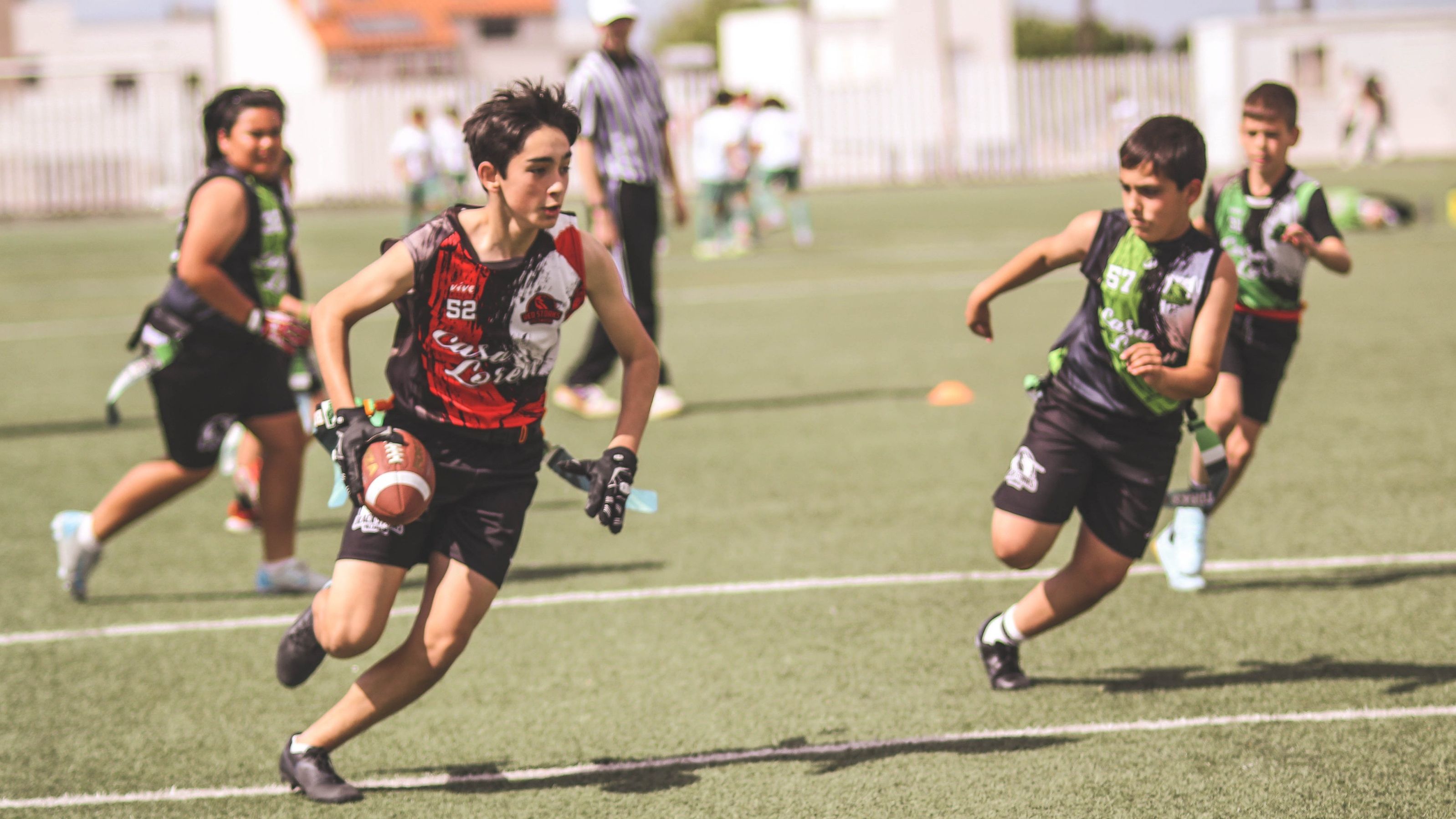 Partido entre Green Storks y Red Storks de flag football infantil